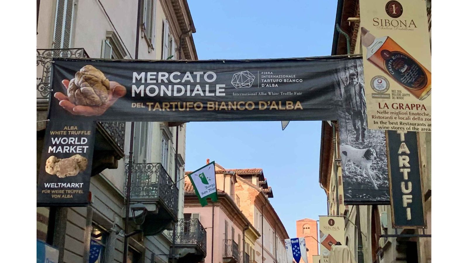 Banner for the Fiera Internazionale del Tartufo Bianco d'Alba — the International Alba White Truffle Fair — on a street in Alba, Piedmont, Italy