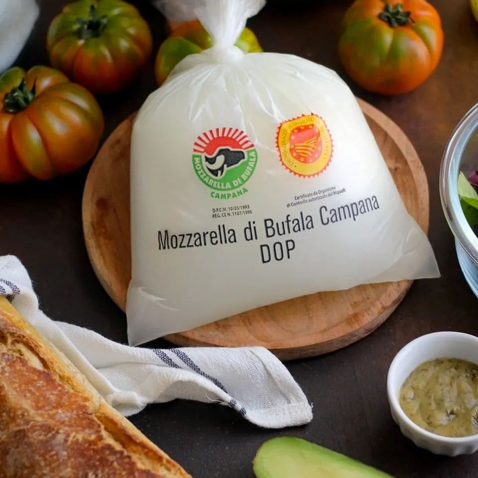 Mozzarella di Bufala Campana DOP in its official Consorzio-trademarked packaging, the only legally protected name for authentic buffalo mozzarella