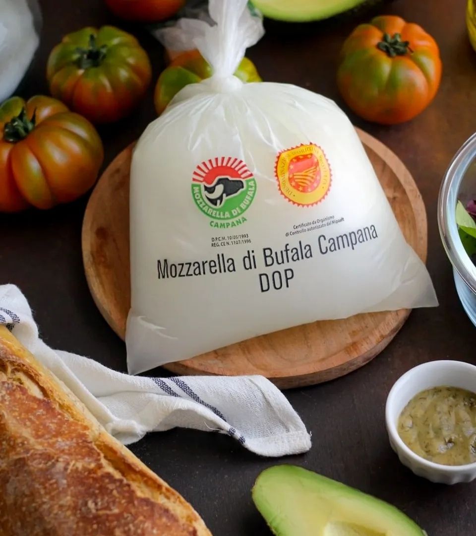 Mozzarella di Bufala Campana DOP in its official Consorzio-trademarked packaging, the only legally protected name for authentic buffalo mozzarella