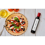 Caprese salad with Milan Balsamic Vinegar of Modena IGP, tomatoes, mozzarella and basil.