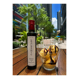 Milan Balsamic Vinegar of Modena IGP served with vanilla gelato and balsamic drizzle.