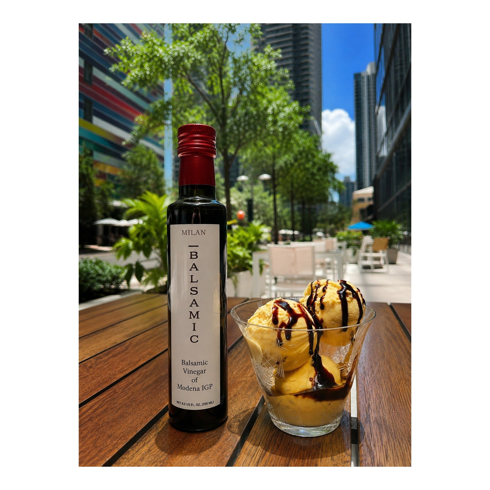 Milan Balsamic Vinegar of Modena IGP served with vanilla gelato and balsamic drizzle.