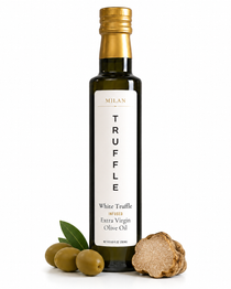 Milan Truffle White Truffle Infused Extra Virgin Olive Oil, styled with whole green olives, a green olive leaf, and a slice of white truffle on a clean white background.